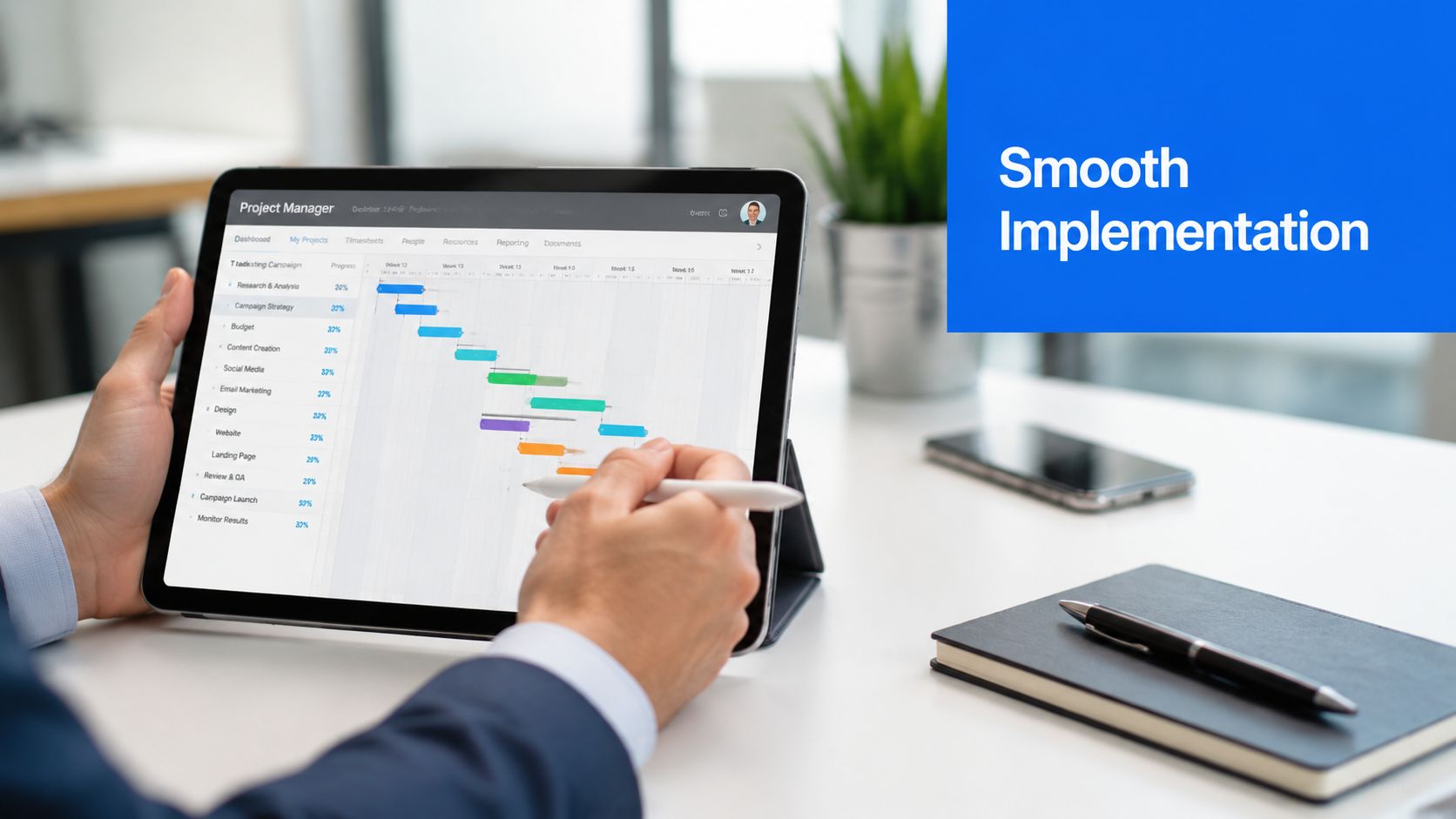 A professional using a tablet to view a project management timeline while sitting at a clean desk.